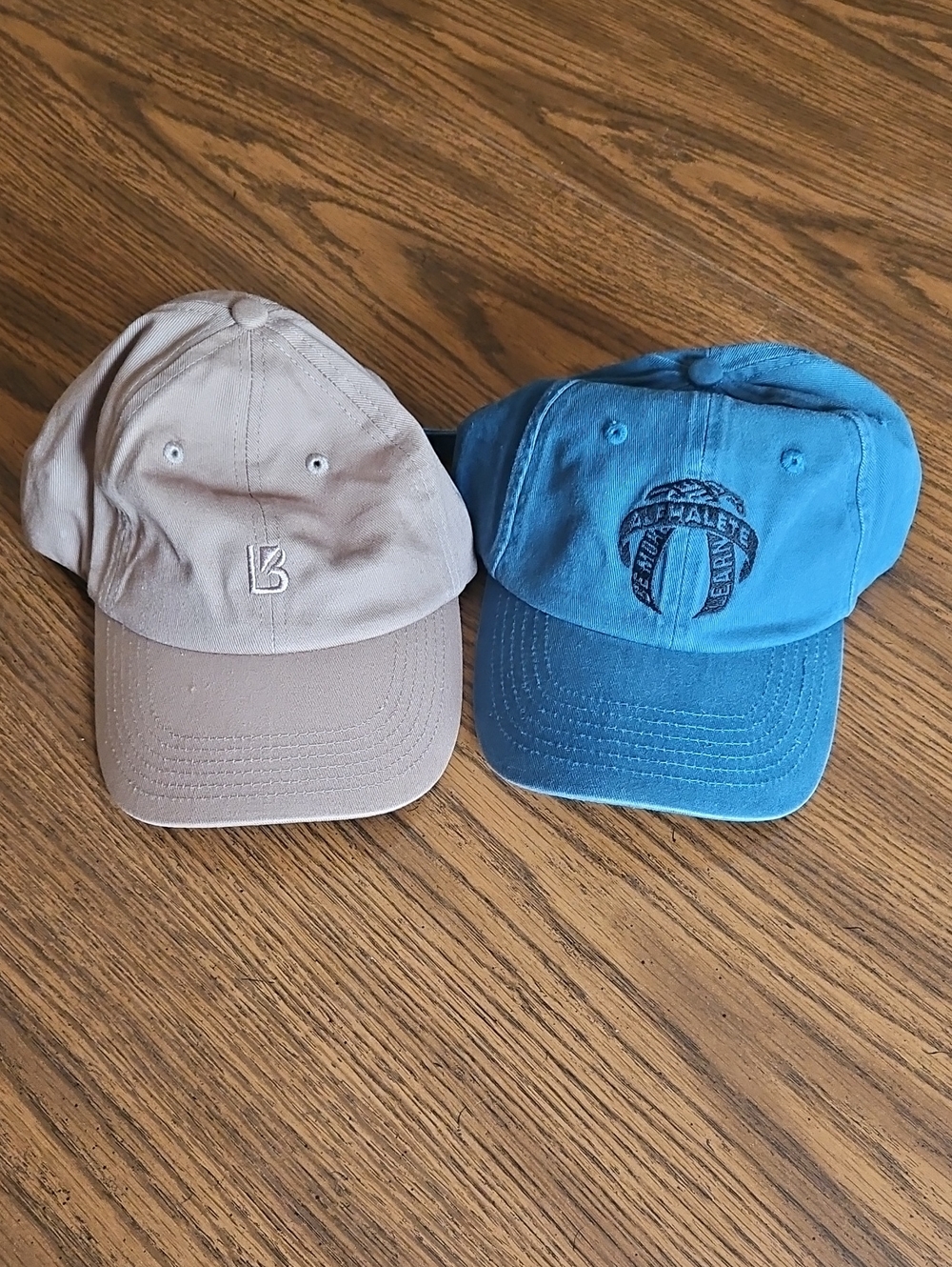 Beige and Blue Baseball Caps